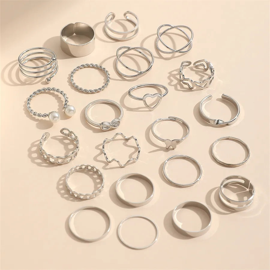 Full set of 22 silver retro rings with assorted designs and pearl inlays