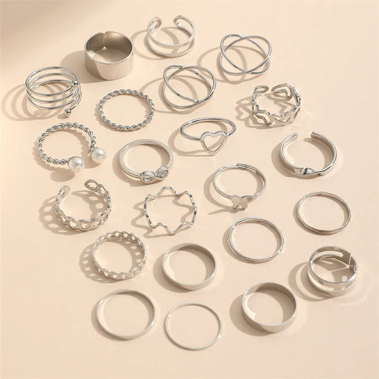 Full set of 22 silver retro rings with assorted designs and pearl inlays