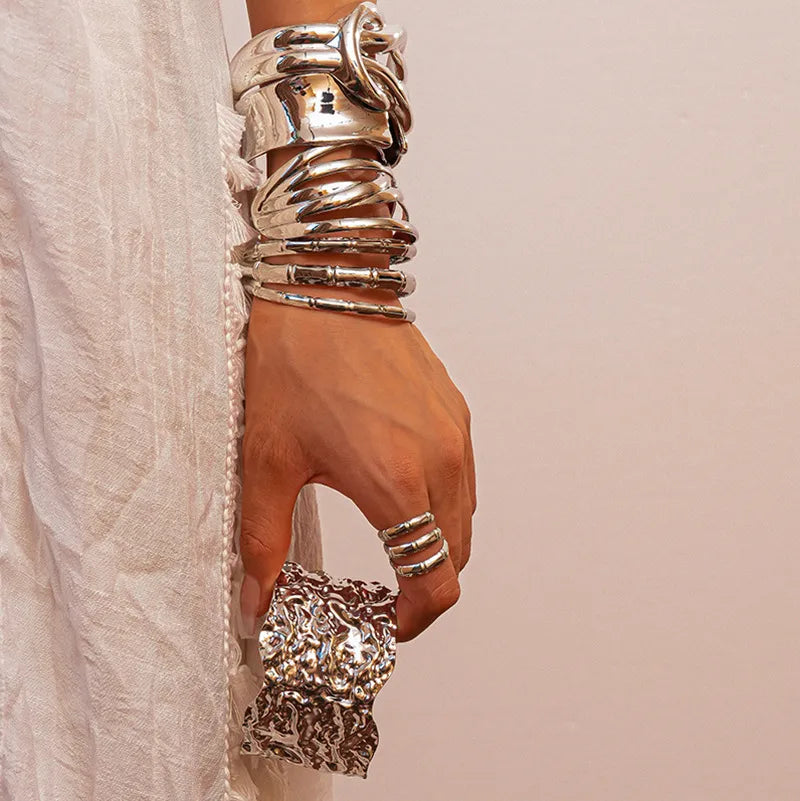 Silver-tone hammered texture cuff bracelet with spiral stacked bangles, unique artistic design