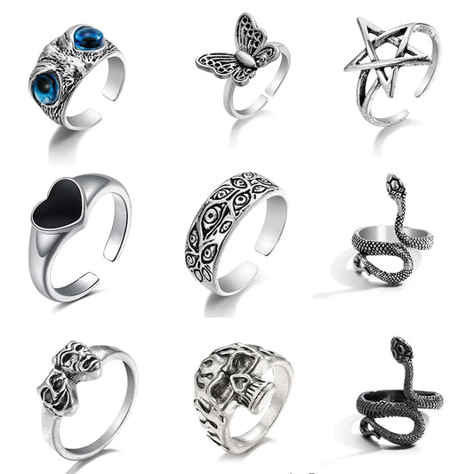Collection of 9 unisex vintage alloy rings with snake, butterfly, skull, and heart designs.